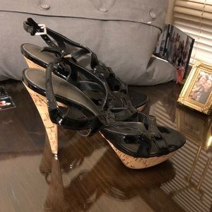 Black patent leather heels with cork platforms